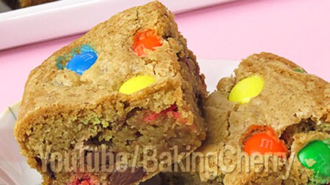 Quick and Easy M&M Cookie Bars Recipe. Learn how to make these soft and chewy cookie bars full of chocolate chips and M&M’s. A delicious treat to indulge your sweet tooth!